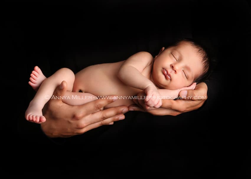 Durham baby photography of newborn in father's arms