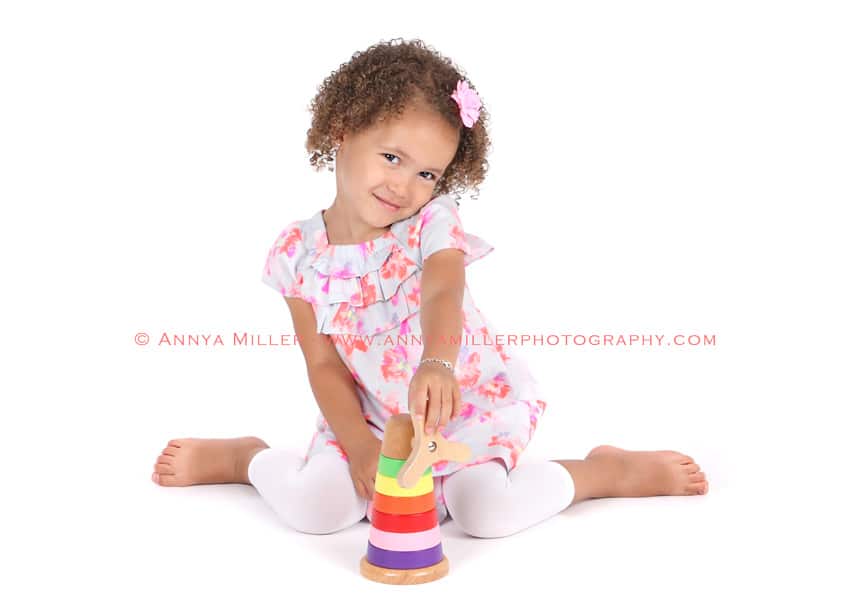 Durham Region kids photography of little girl with toy