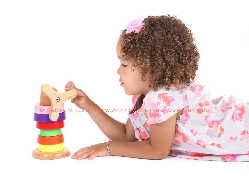 Durham Region kids photography of 3 year old girl with toy