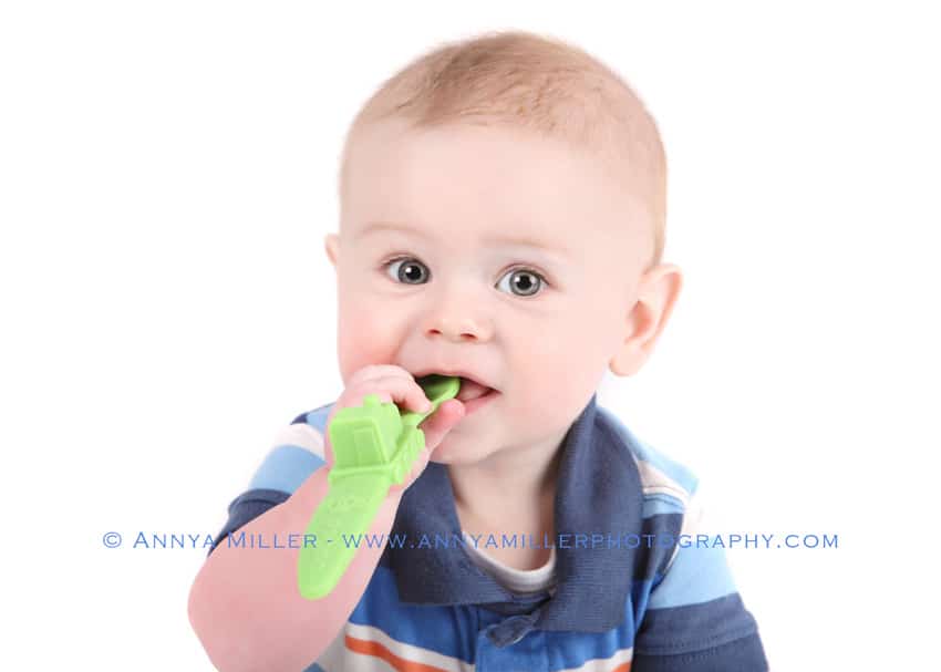 Pickering baby photography of infant chewing spoon