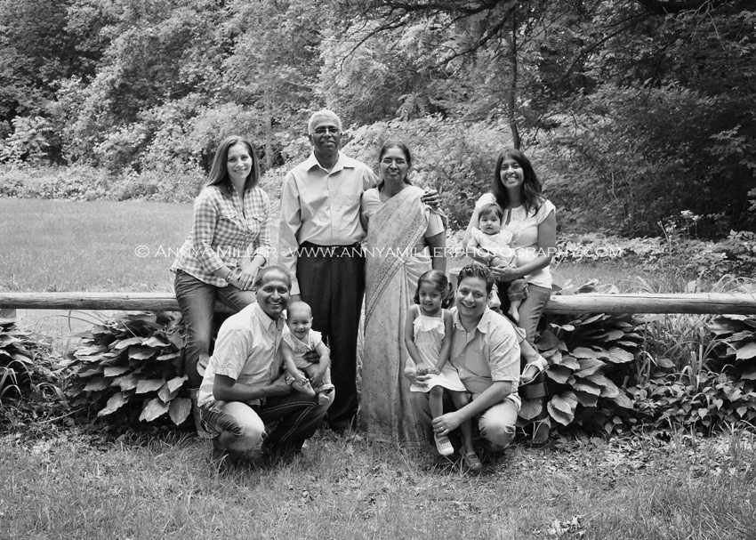 Black and white family portrait at outdoor location