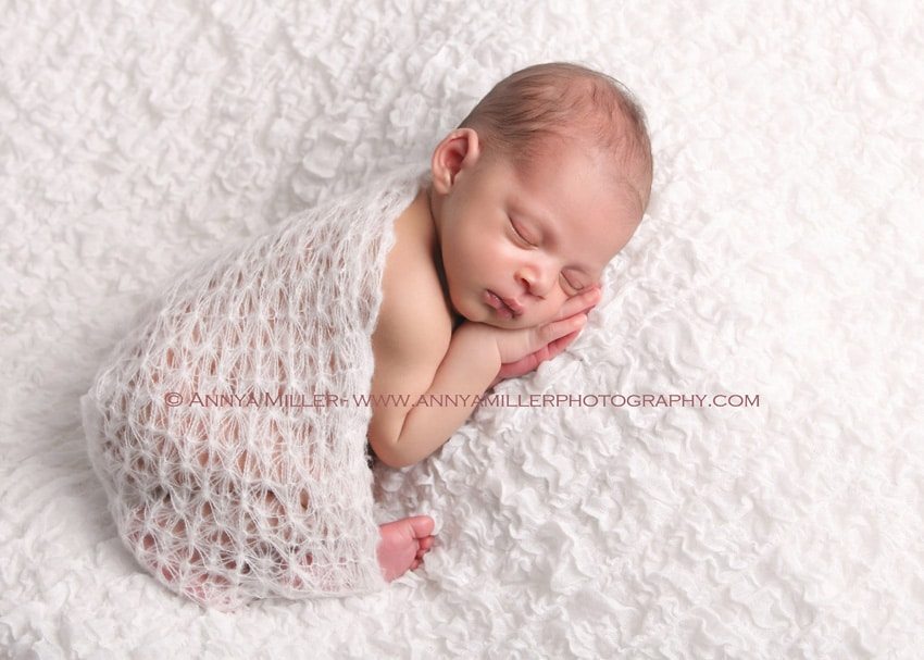 Durham baby photography of newborn in white wrap
