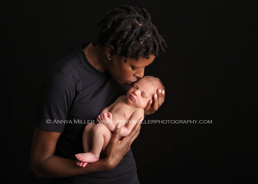 Photography of newborn baby girl with mom in Pickering