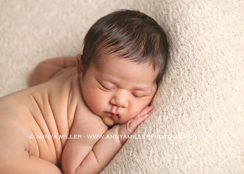 Portrait of newborn girl by Durham Region baby photographer
