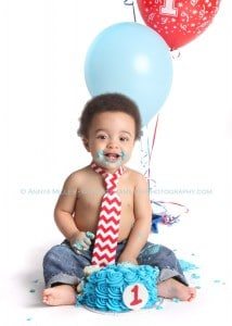 Twin babies doing first birthday cake smashes in Pickering photography studio
