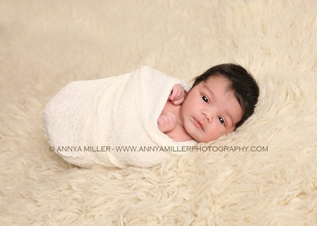 Ajax newborn photography of brand new baby girl
