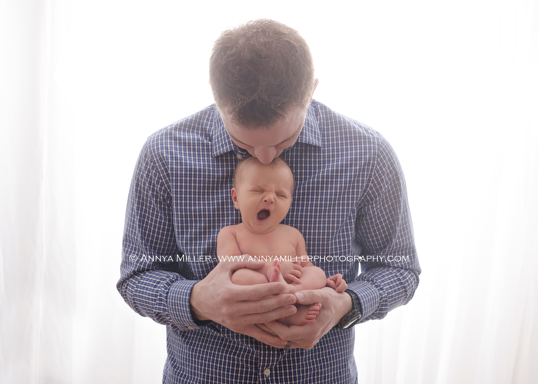 Portrait of a newborn baby girl with her dad by Toronto newborn photographer Annya Miller