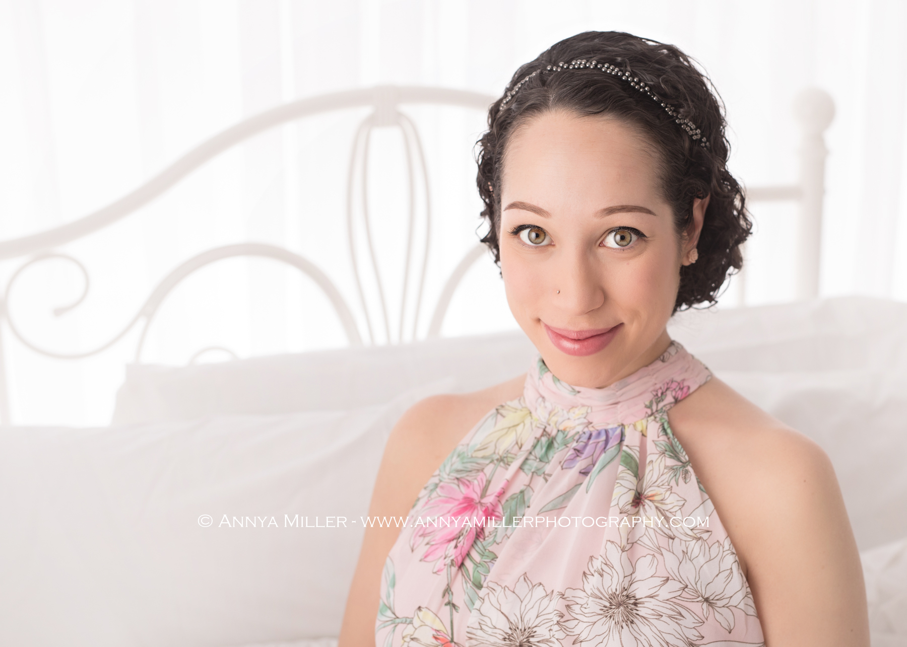 pregnancy portraits on white bed by durham region maternity photographer Annya Miller 