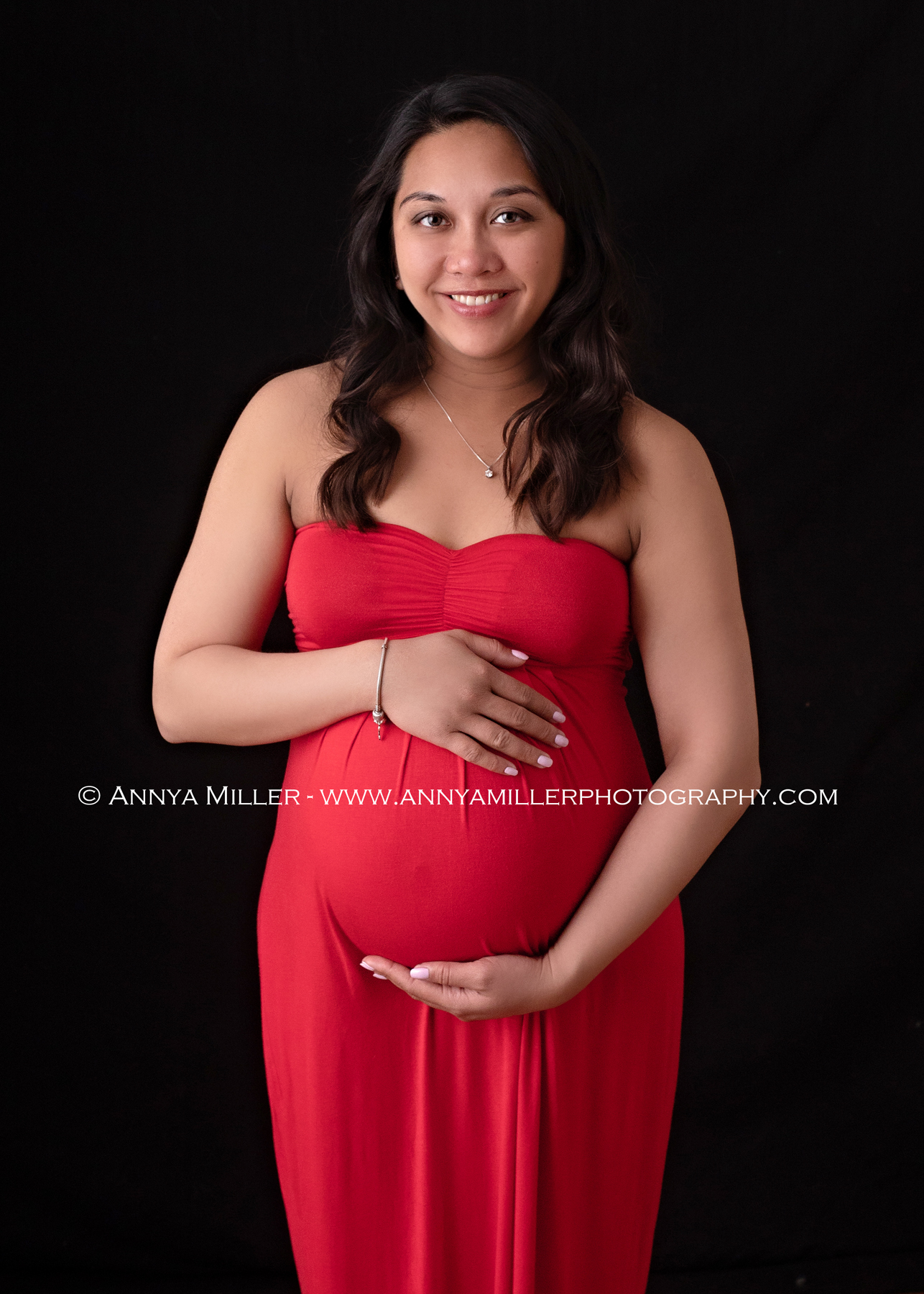 Pregnancy portraits of woman about to become new mom by Durham maternity photographer Annya Miller in Pickering