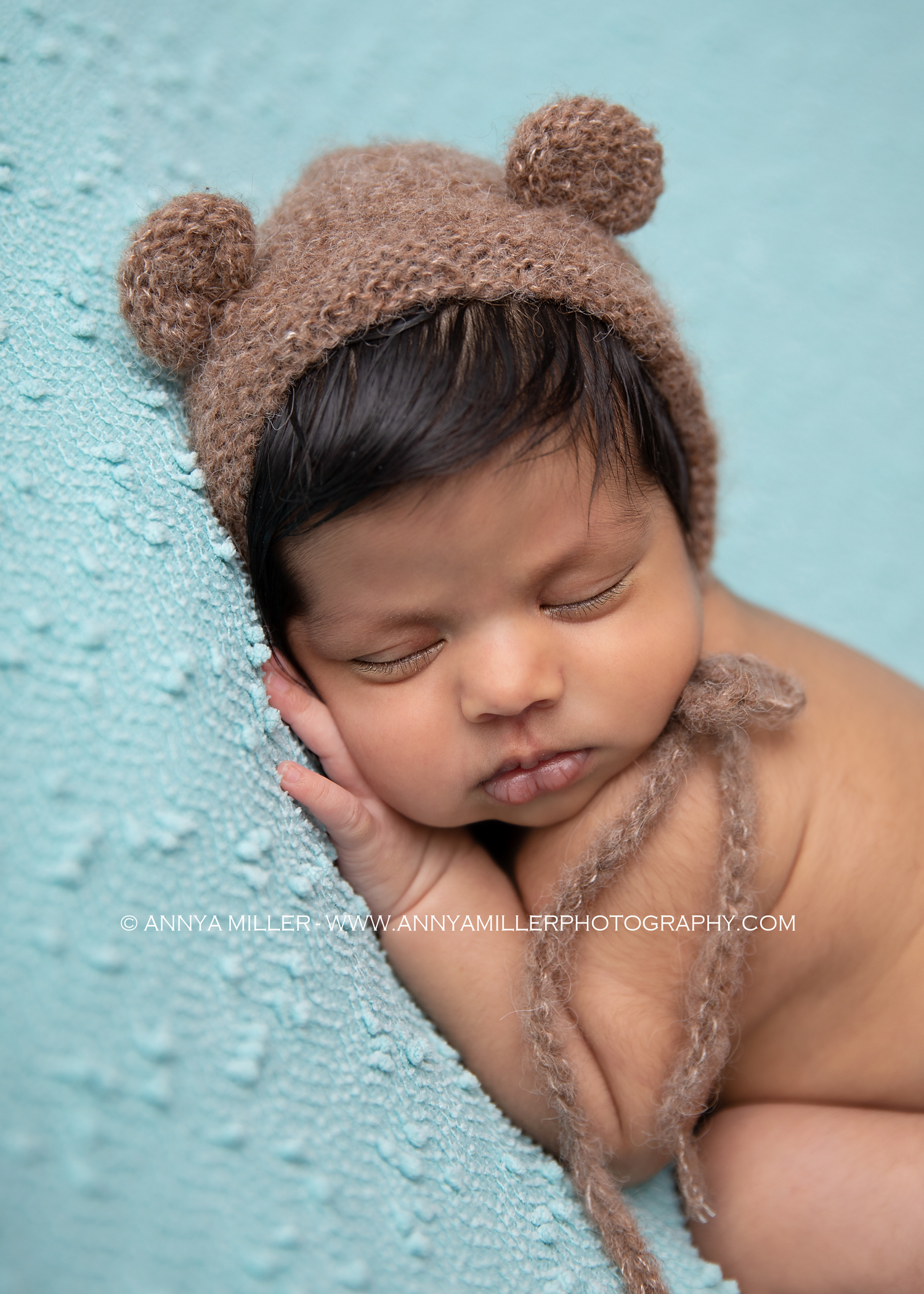 Durham newborn photos of baby boy in bear bonnet by Annya Miller photography