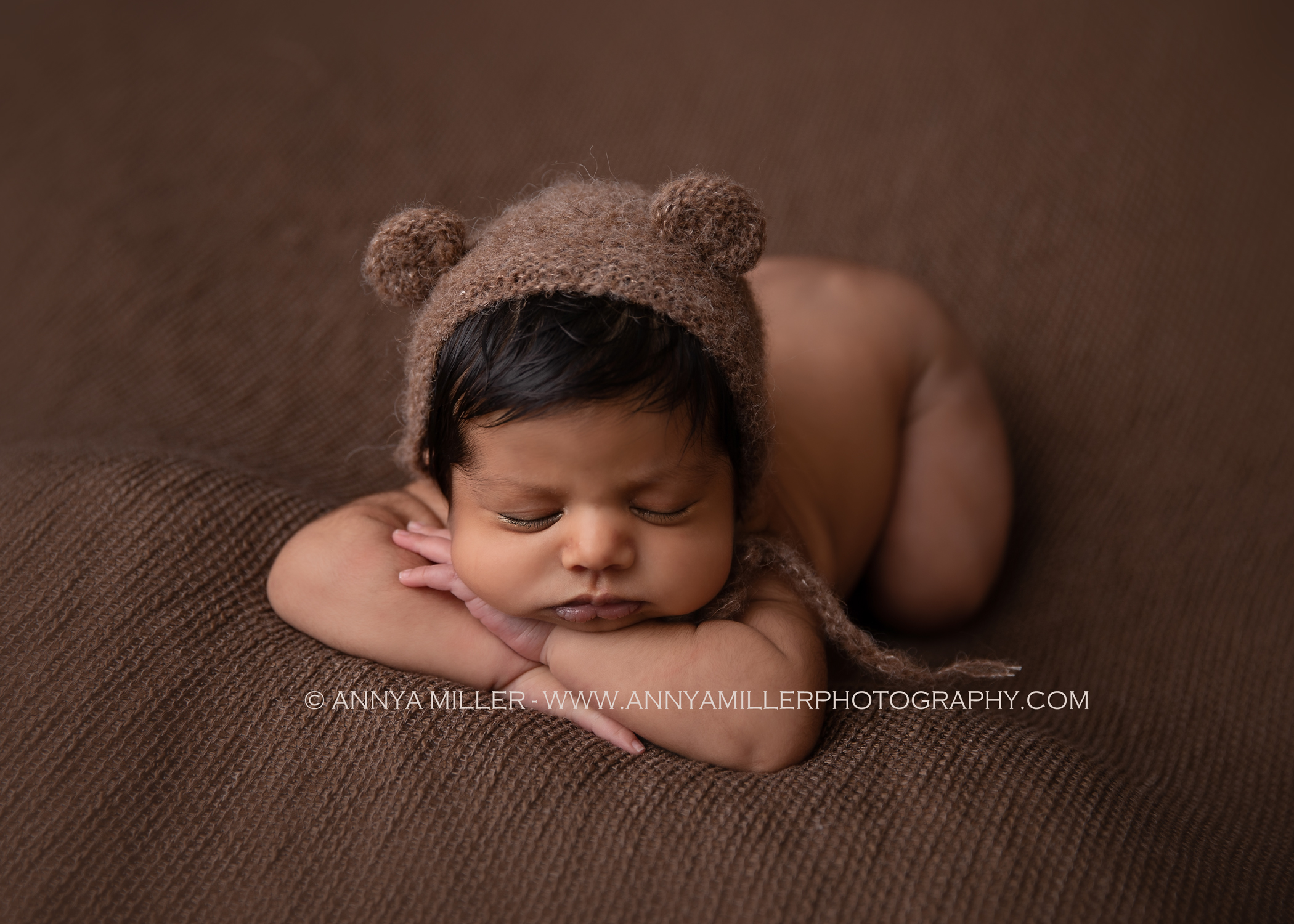 Durham newborn photos of baby boy in bear bonnet by Annya Miller photography