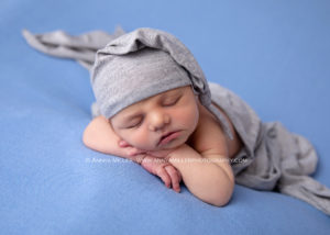 Photographs of newborn boy sleeping by Toronto area newborn photographer Annya Miller of Pickering