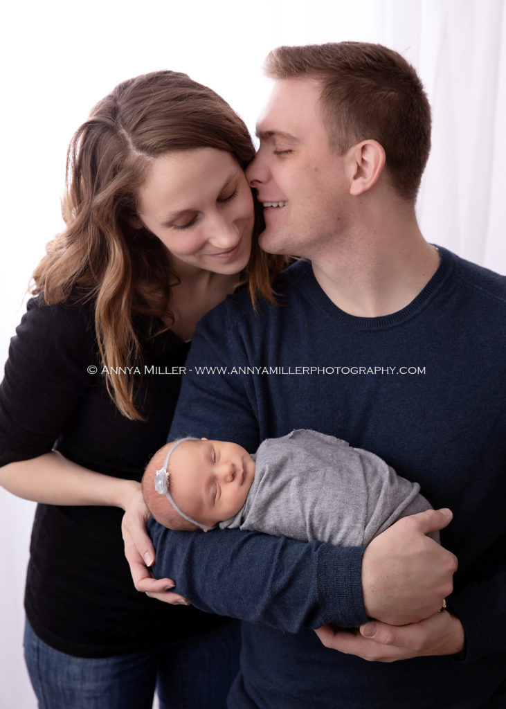 Portrait of newborn baby girl and her parents by Pickering newborn photographer Annya Miller