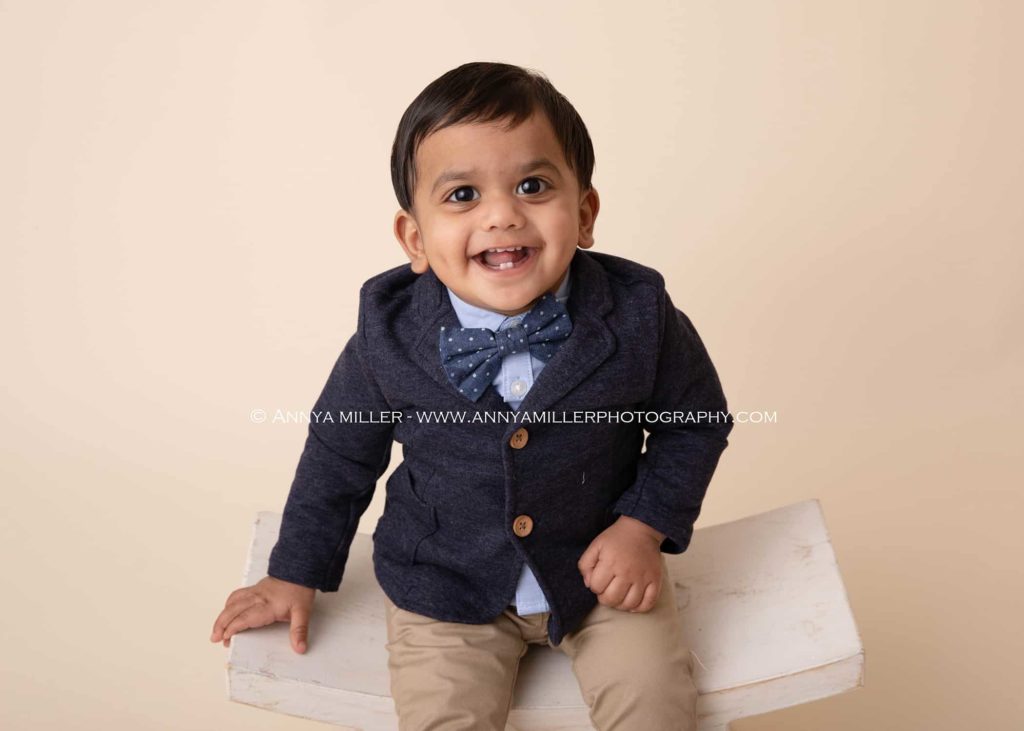 Baby boy in adorable suit for his first birthday